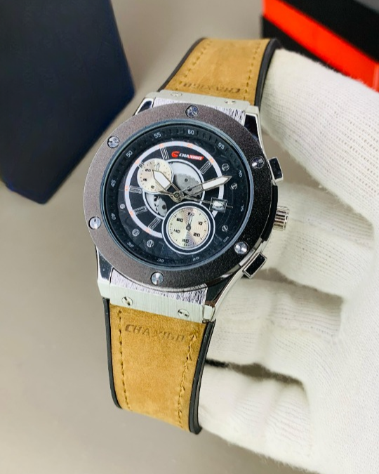 Side view of CHAXIGO Men's Watch with Camel Brown Leather Strap and Stainless Steel Case
